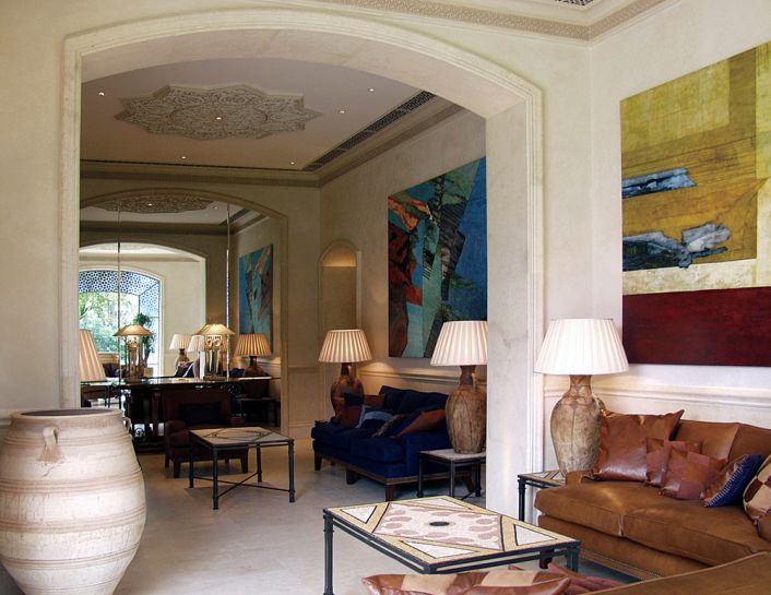 Private Lives Interior Design Portfolio -  International - Contemporary art stone walls and leather furniture